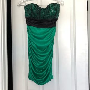 Emerald green strapless dress with beaded top.